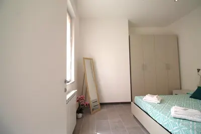 Letto o letti in una camera di Casa Anna Cagliari