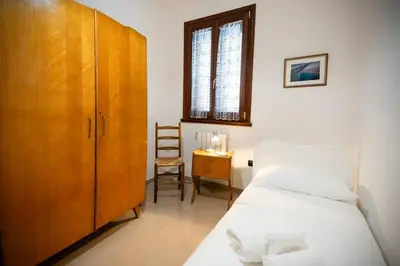 Letto o letti in una camera di La Via per Tharros