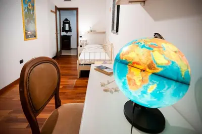 Letto o letti in una camera di La Via per Tharros