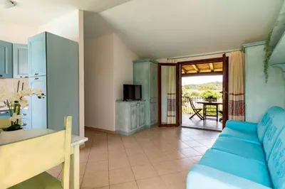 Area soggiorno di Museddu Beach Residence
