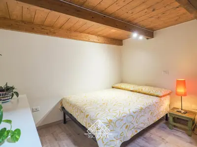 Letto o letti in una camera di Domu Mea - Morada