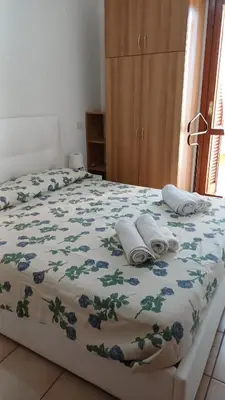Letto o letti in una camera di Wonderful holiday: relax in the green Villasimius