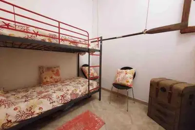 Letto o letti in una camera di Sant Antioco, la vista sulla laguna Q2127