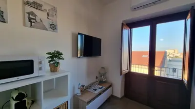 TV o dispositivi per l'intrattenimento presso Appartamento Is Arutas