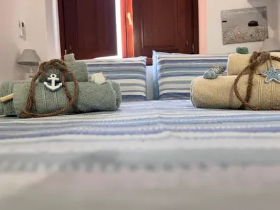 Letto o letti in una camera di Appartamento Is Arutas