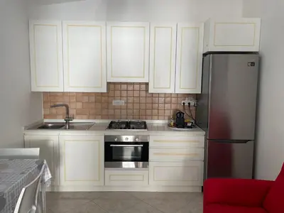 Cucina o angolo cottura di Accogliente casa a due passi dal mare.