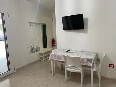 TV o dispositivi per l'intrattenimento presso Accogliente casa a due passi dal mare.