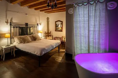 Letto o letti in una camera di Le Meraviglie di Alice