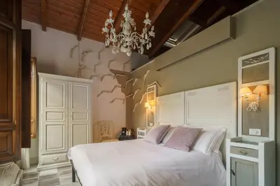 Letto o letti in una camera di Le Meraviglie di Alice