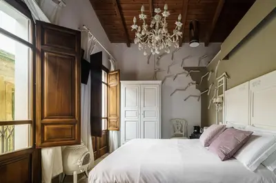 Letto o letti in una camera di Le Meraviglie di Alice