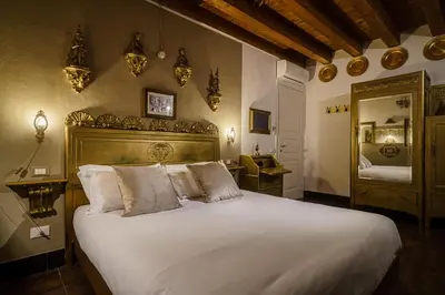 Letto o letti in una camera di Le Meraviglie di Alice