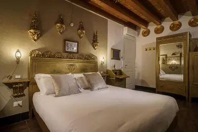 Letto o letti in una camera di Le Meraviglie di Alice