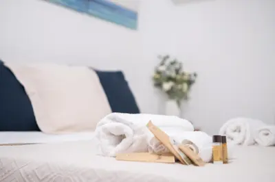 Letto o letti in una camera di Villa sul mare Porto Corallo