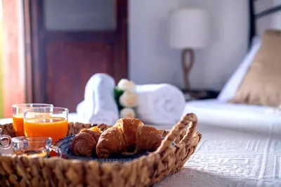 Letto o letti in una camera di Villa sul mare Porto Corallo
