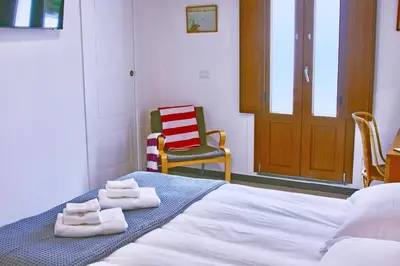 Letto o letti in una camera di Monolocale a pochi passi dal mare