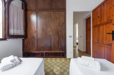 Letto o letti in una camera di Palm Villa
