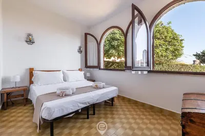 Letto o letti in una camera di Palm Villa