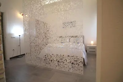 Letto o letti in una camera di Casa Daniela Cagliari