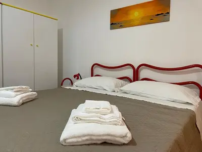 Letto o letti in una camera di Da Mamma IUN Q9152