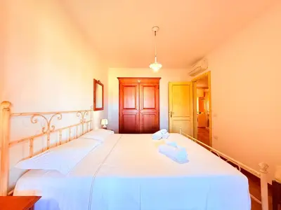 Letto o letti in una camera di Mereu Central Apartment