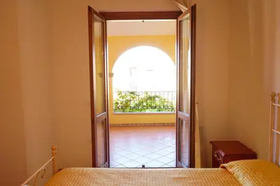Letto o letti in una camera di Mereu Central Apartment