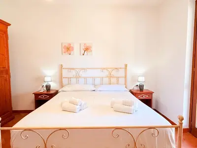 Letto o letti in una camera di Mereu Central Apartment
