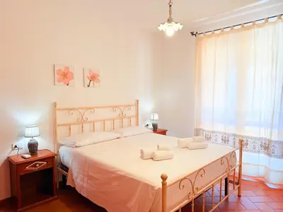 Letto o letti in una camera di Mereu Central Apartment
