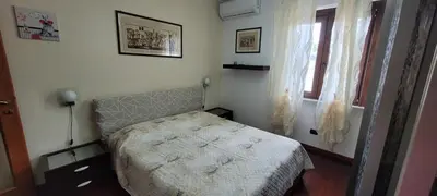 Letto o letti in una camera di Kokky's Home