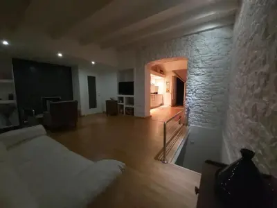 Letto o letti in una camera di Casetta del cuore intero appartamento con camino