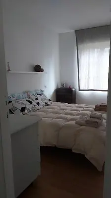 Letto o letti in una camera di Casetta del cuore intero appartamento con camino