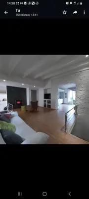 Letto o letti in una camera di Casetta del cuore intero appartamento con camino