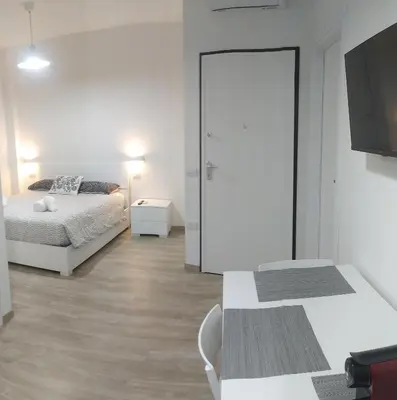 Letto o letti in una camera di Town Center Apartment