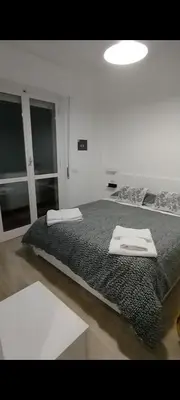 Letto o letti in una camera di Town Center Apartment