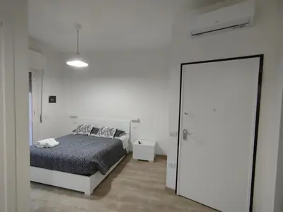Letto o letti in una camera di Town Center Apartment