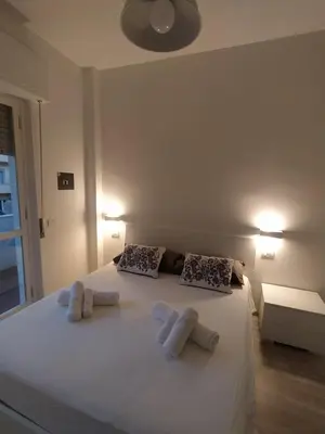 Letto o letti in una camera di Town Center Apartment