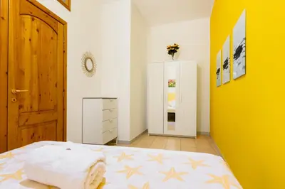 Letto o letti in una camera di Casa Ludovica a 100 passi dal mare