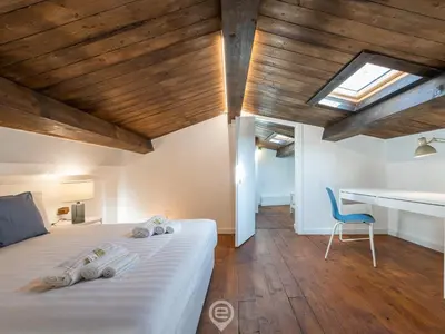 Letto o letti in una camera di Luisa Apartment