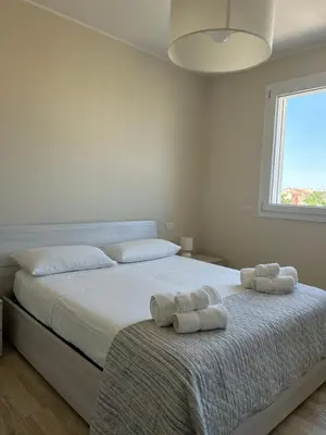 Letto o letti in una camera di Piccola residenza del parco