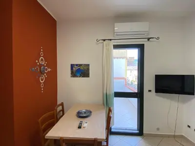 TV o dispositivi per l'intrattenimento presso appartamento in centro storico con parcheggio coperto, Musci'