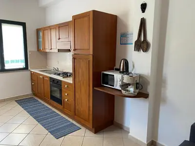 Cucina o angolo cottura di appartamento in centro storico con parcheggio coperto, Musci'