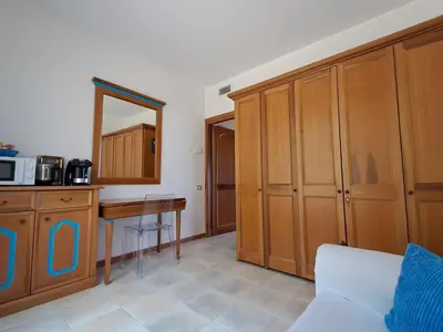 Cucina o angolo cottura di Golf & Sea Residence Is Molas