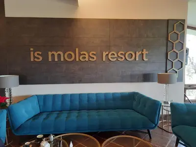 Area soggiorno di Golf & Sea Residence Is Molas