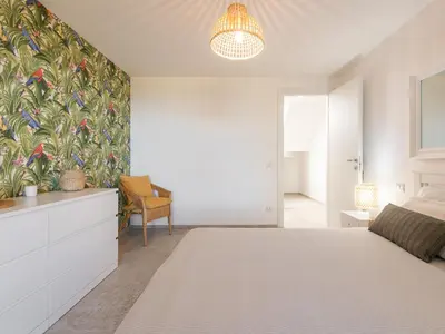 Letto o letti in una camera di Villa Belvedere
