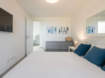 Letto o letti in una camera di Villa Belvedere