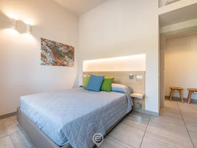 Letto o letti in una camera di Poetto Sea Breeze - Orange