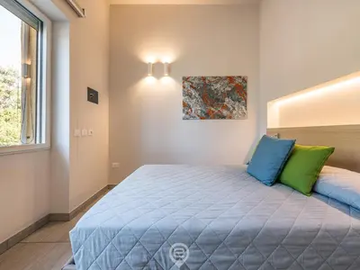 Letto o letti in una camera di Poetto Sea Breeze - Orange