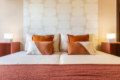 Letto o letti in una camera di Colle Bonaria Apartment
