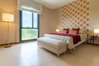 Letto o letti in una camera di Colle Bonaria Apartment