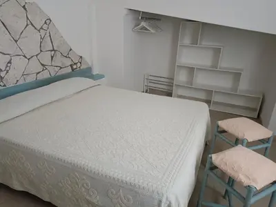 Letto o letti in una camera di CASA ZENOBIO