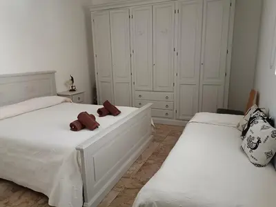 Letto o letti in una camera di CASA ZENOBIO